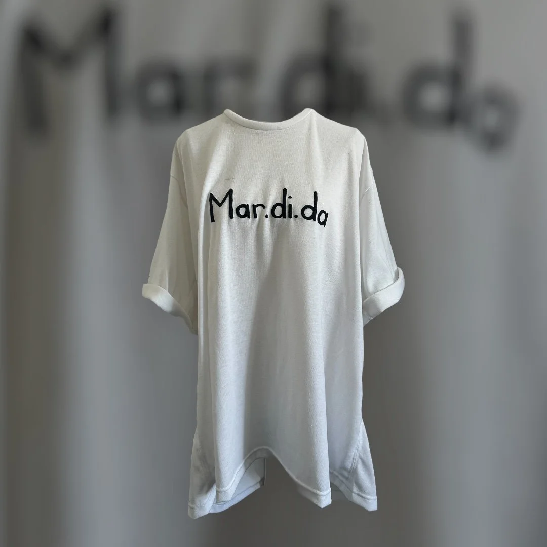 Custom made heavy poly cotton oversized tee with printed logo.