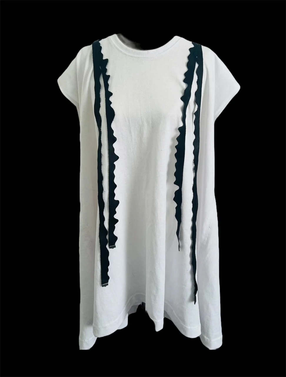 Custom made heavy poly cotton sleeveless oversized tee with four curved removable leather straps.