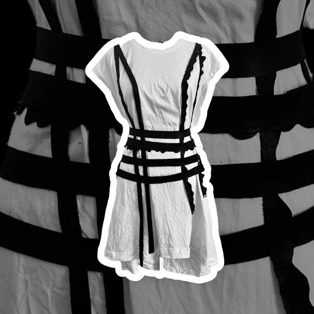 Custom made heavy poly cotton sleeveless oversized tee with removable leather harness.
