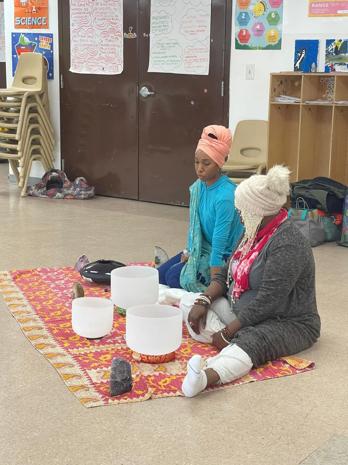 2 woman using crystal bowl for event