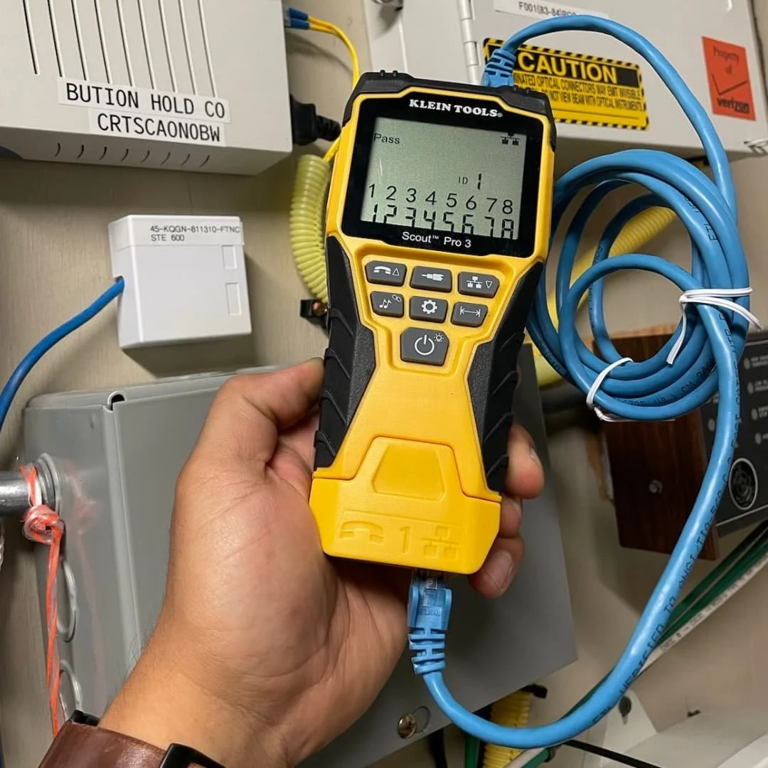 Ethernet cable connected to a LAN tester in Cerritos, CA.