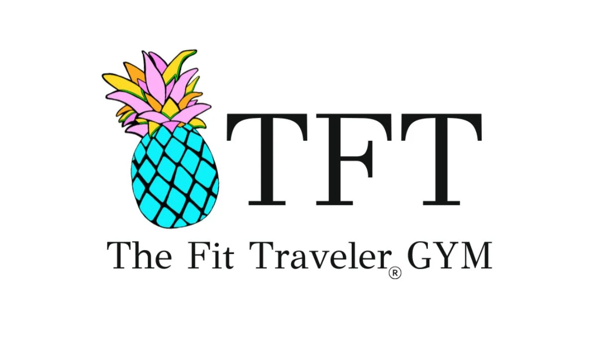Logo for The Fit Traveler GYM featuring a colorful pineapple illustration and the text 'TFT' and 'The Fit Traveler GYM'.