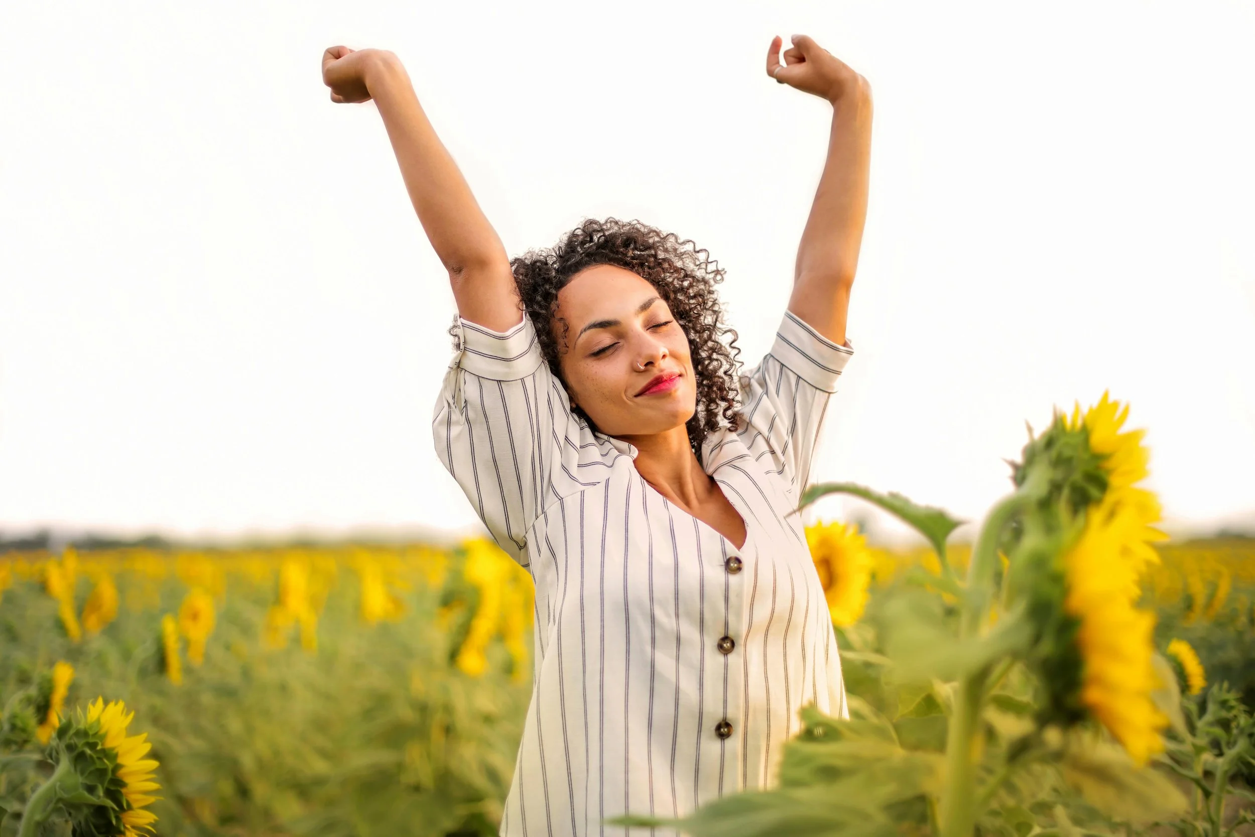 Woman thoughtfully and confidently, reflecting emotional healing, stronger self-worth, and healthier relationship patterns