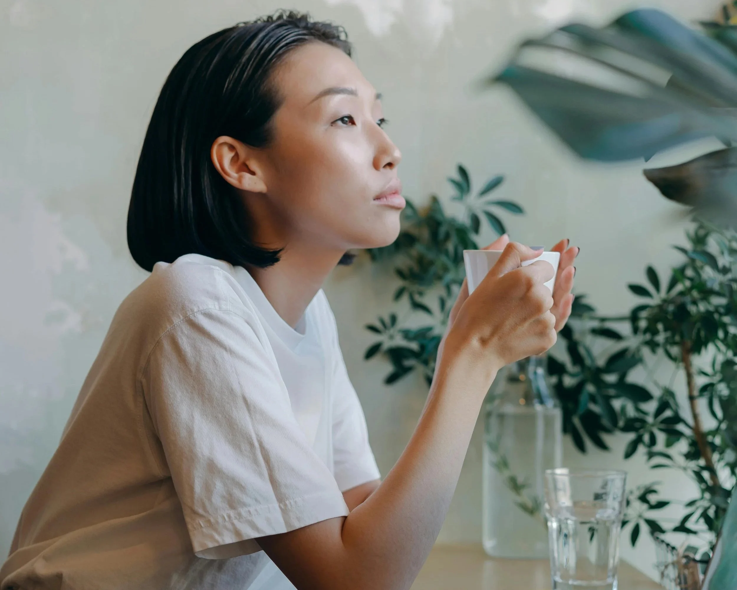 Christian woman sitting quietly, reflecting on relationships, boundaries, and emotional clarity