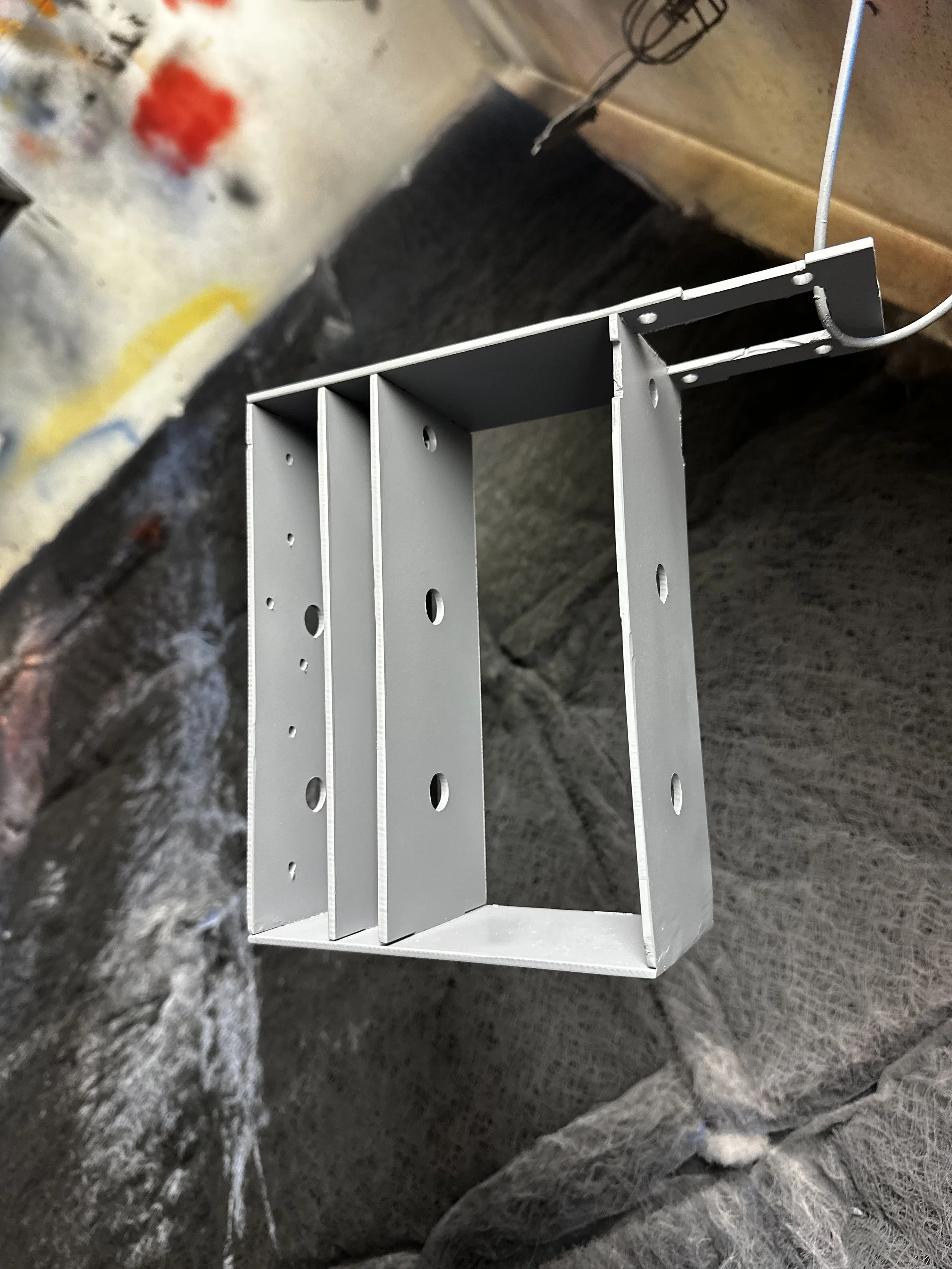 Transmission housing in paint booth