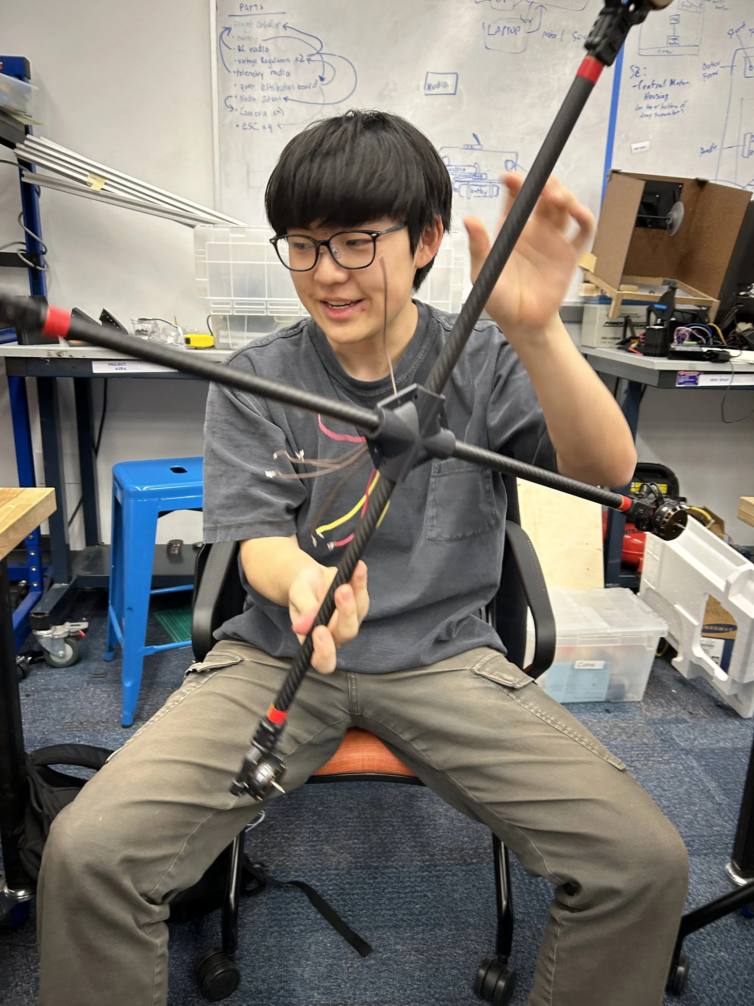  Top propeller hub assembly held up by mechanical designer Matthew Kwon 