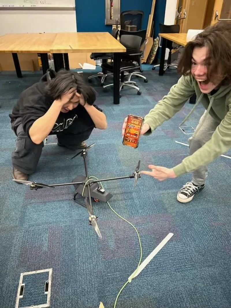  Image taken of electrical/software engineer Liam Fries and I at 5am following first successful test of drone and its tracking capabilities 