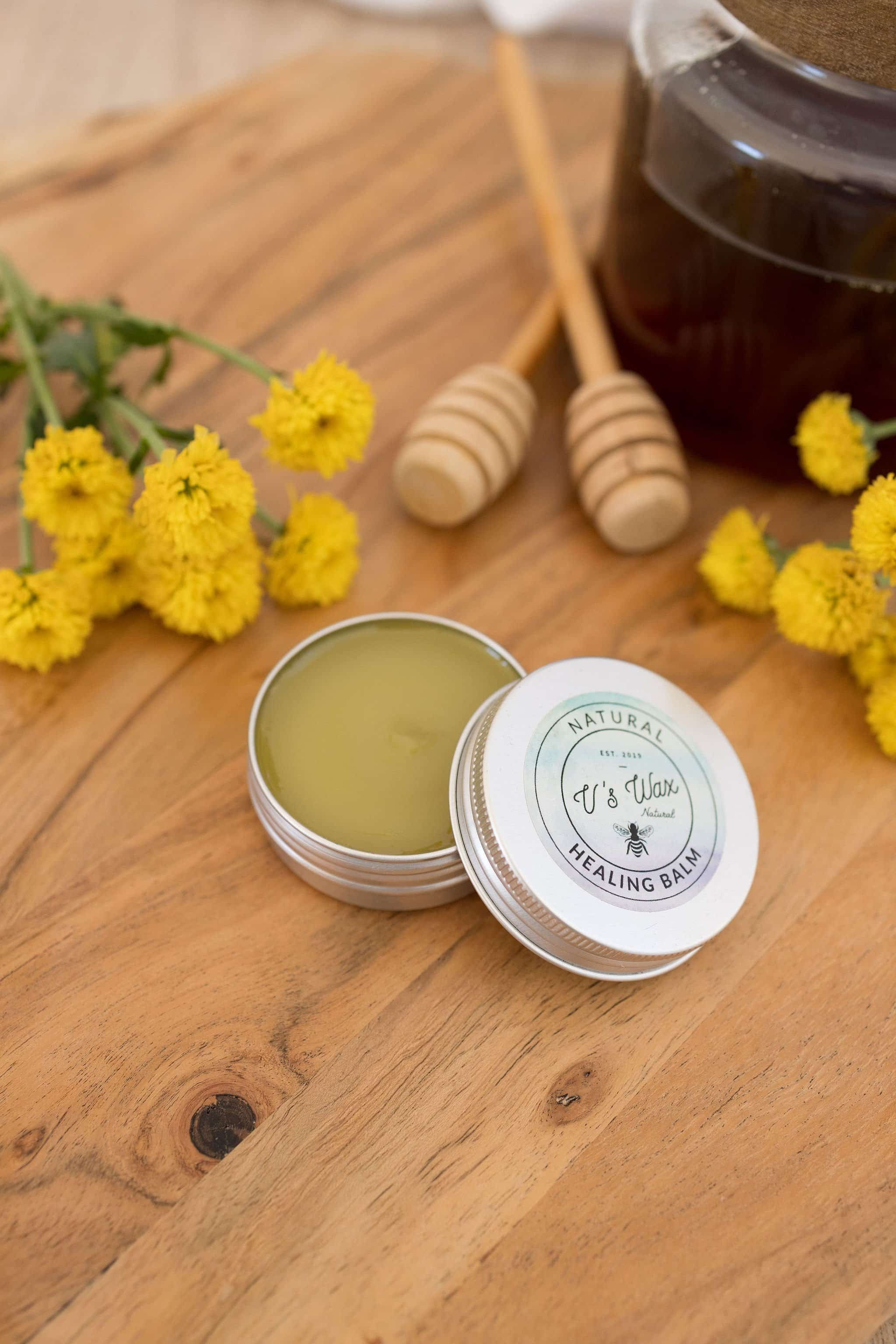 V's Wax Natural Healing Balm jar displayed on a neutral background