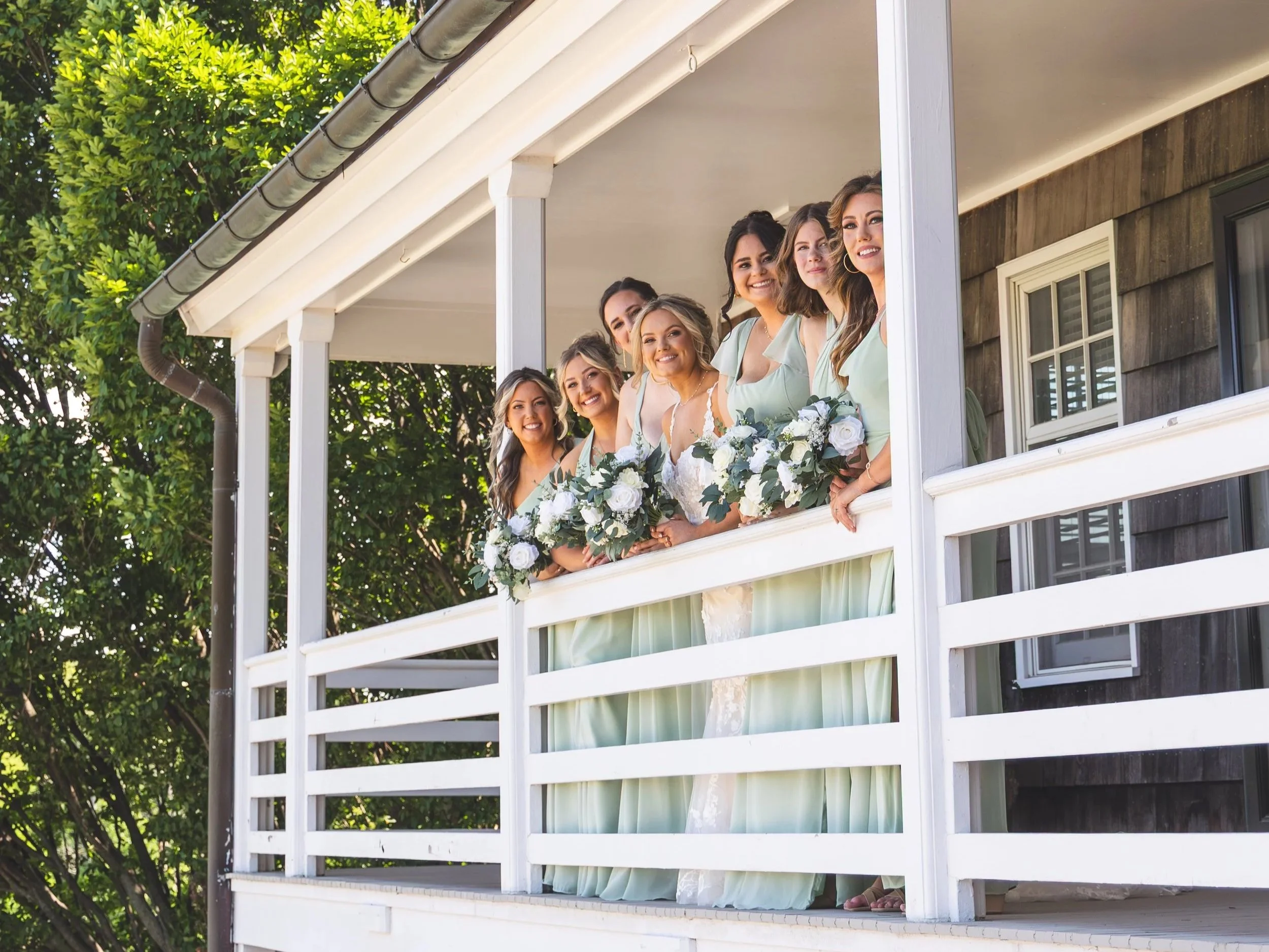 mildale-farm-bride-bridesmaids-porch.jpg