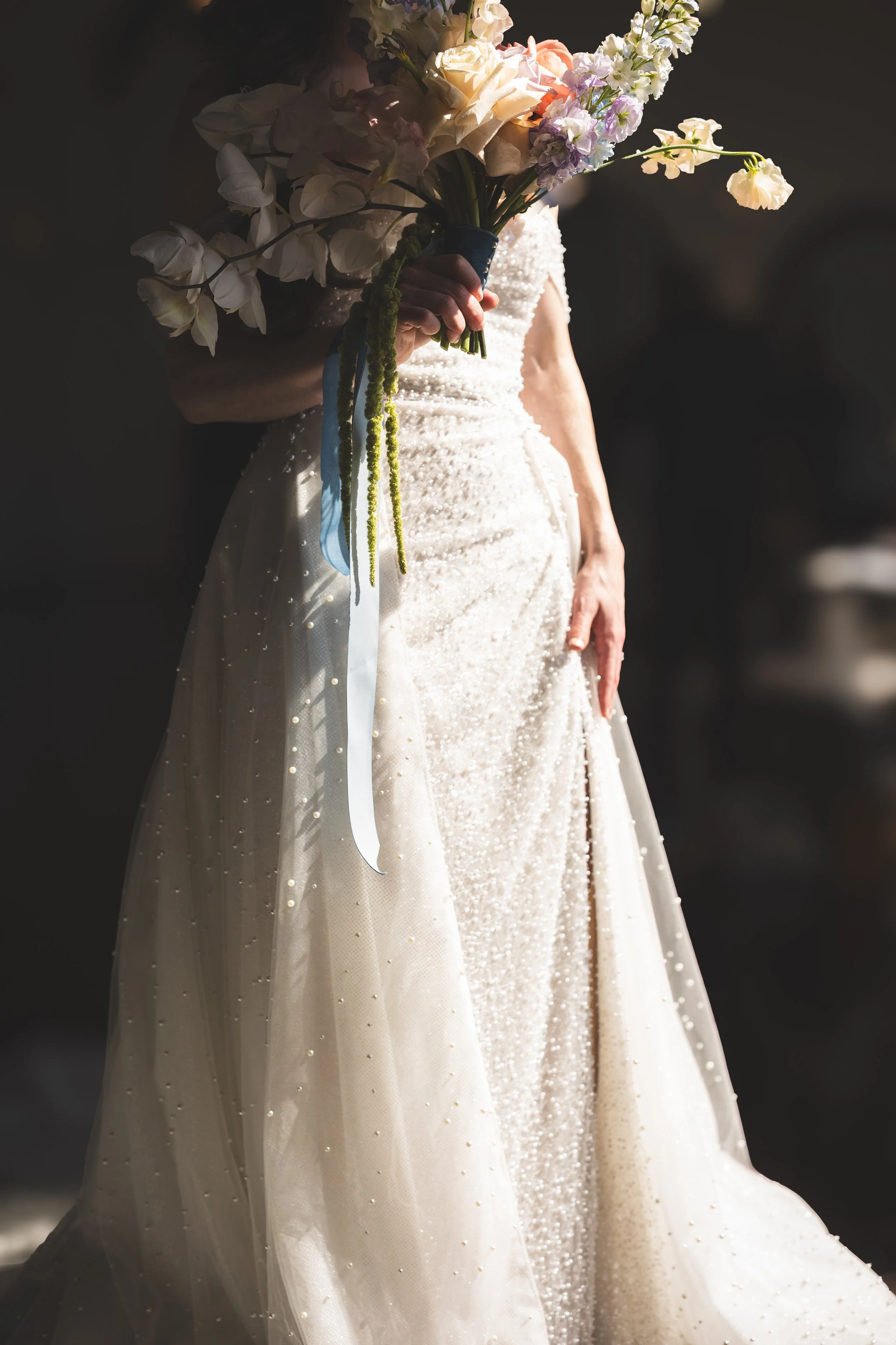 wedding-portraits-dress-details-flowers-pearls.jpg