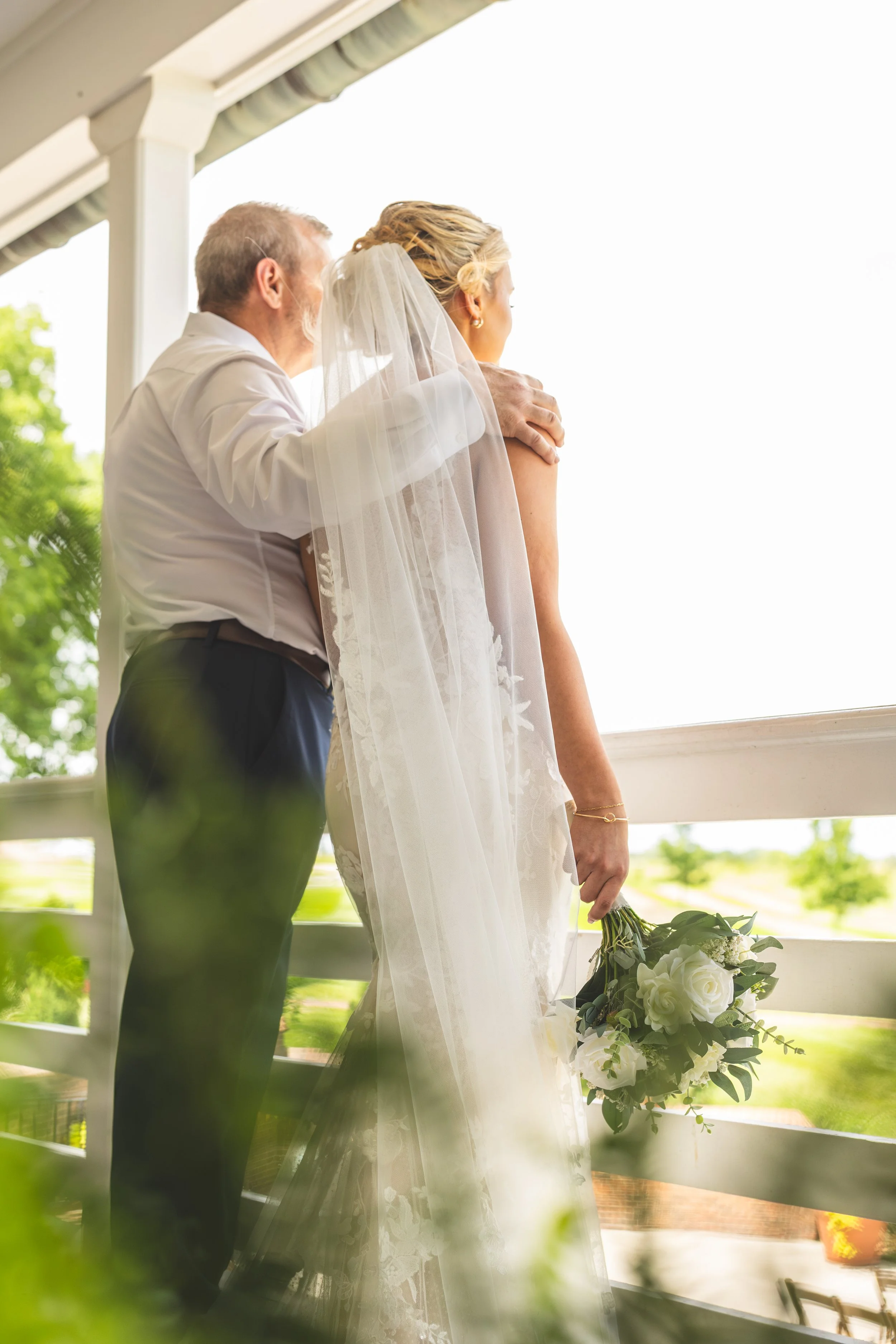 mildale-farm-father-bride-hugging.jpg