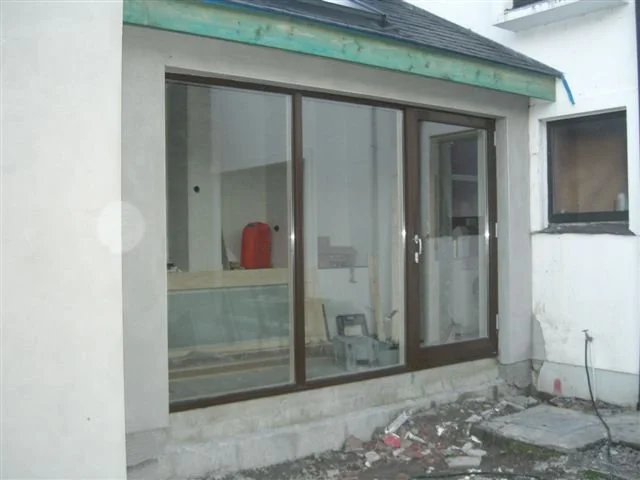 Partially constructed patio with sliding glass doors
