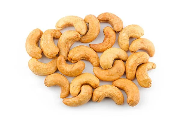 Roasted cashew nuts on a white background