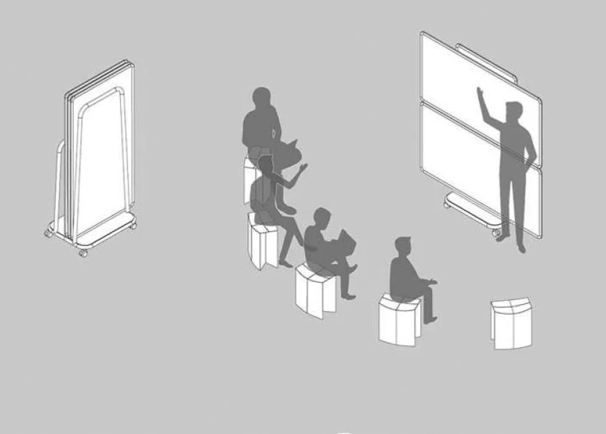 A classroom or educational setting with a teacher standing in front of a whiteboard, addressing five students seated on stools and a bench, some holding books.