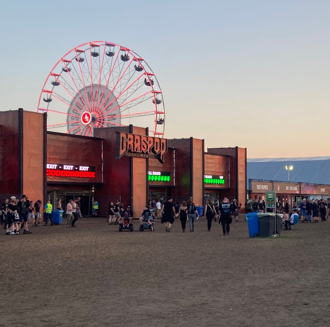Open air music festival Graspop Metal Meeting GMM GMM24 metalheads sunset big ferris observation wheel