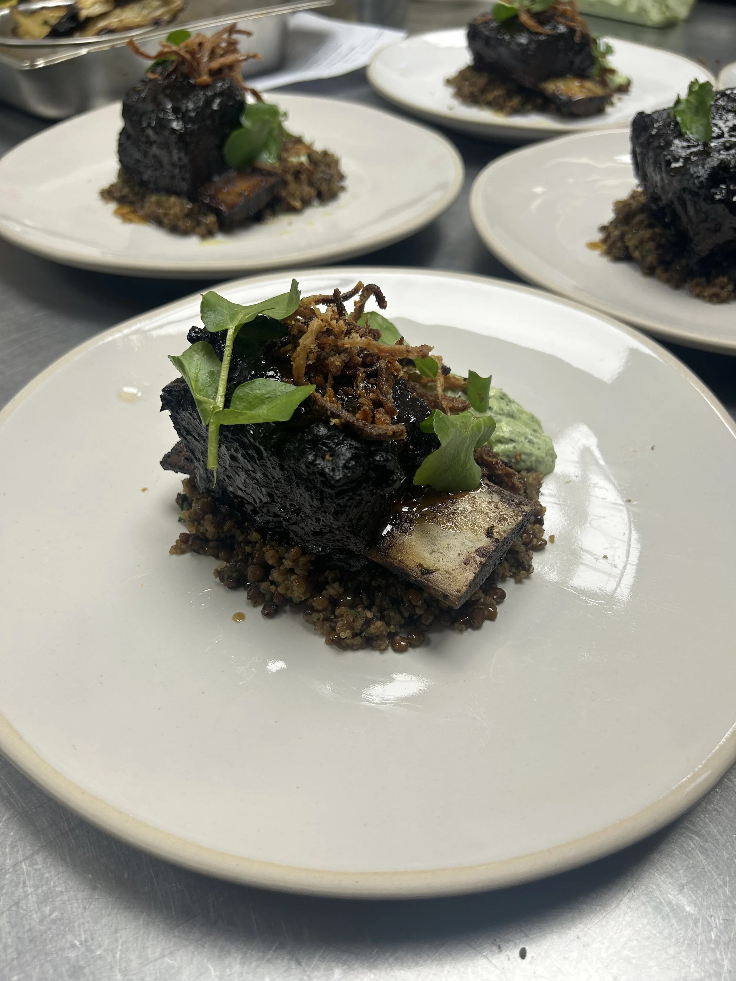 Short rib with preserved lemon dressing, mujaddara, and Watercress