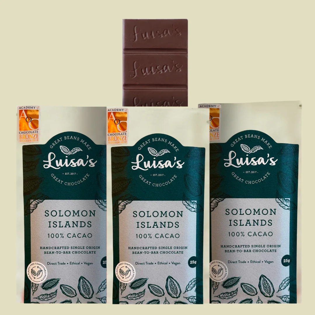 An image of three identical packaging of Luisa's great chocolate Solomon Islands 100% cacao. Handcrafted, single origin bean-to-bar chocolate.