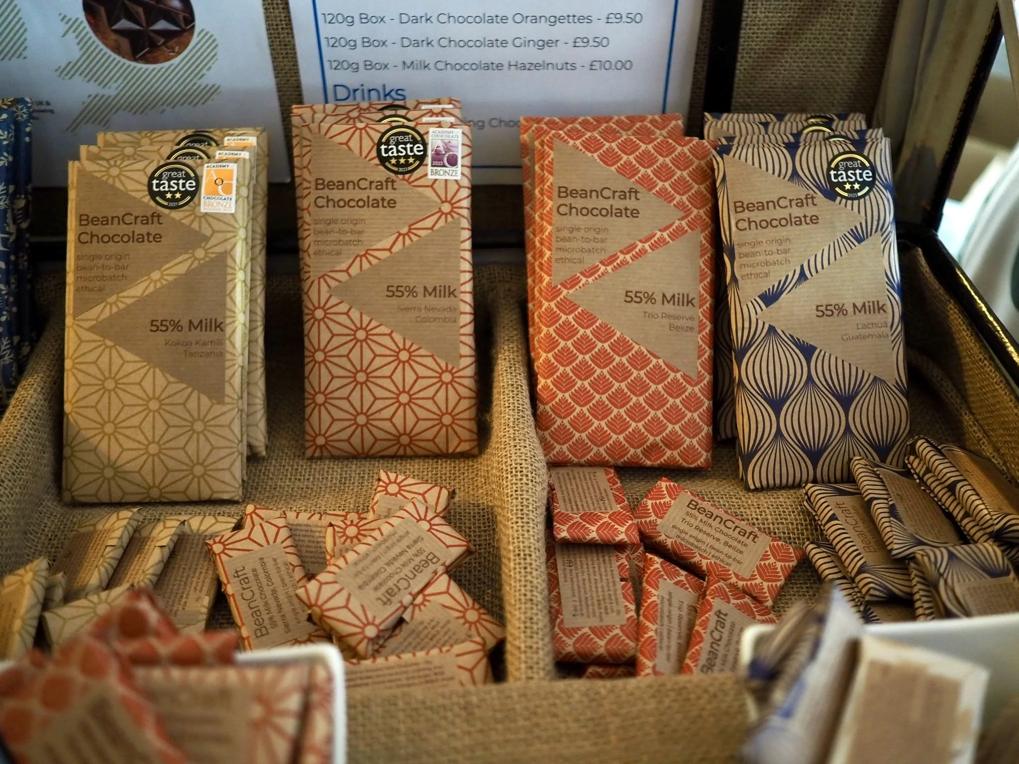 Beautifully packaged BEancraft milk chocolate bars in large and mini versions in a jute cocoa sack-lined hamper