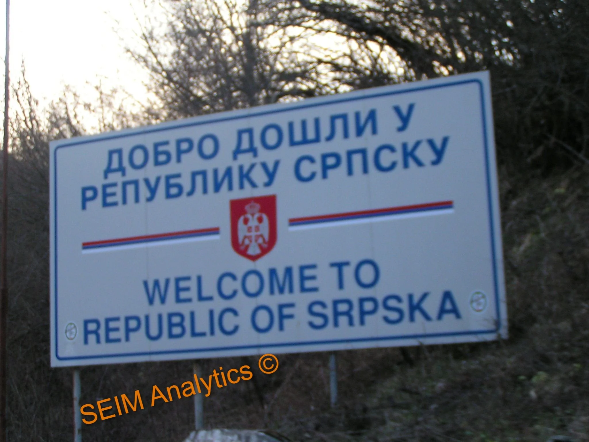 Welcome sign for the Republic of Srpska with the Serbian coat of arms and text in both Serbian and English.