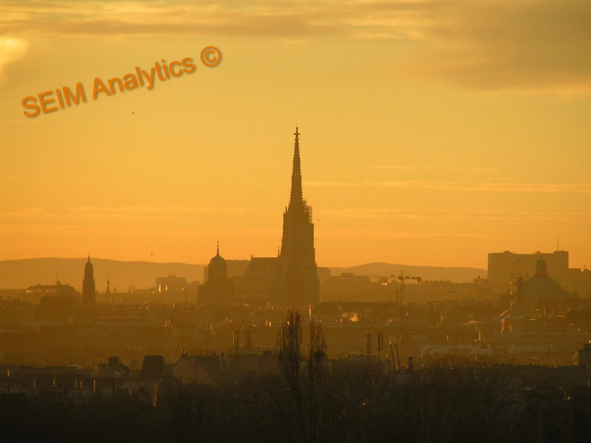Sunset over Vienna city skyline with the prominent St. Stephan's cathedral