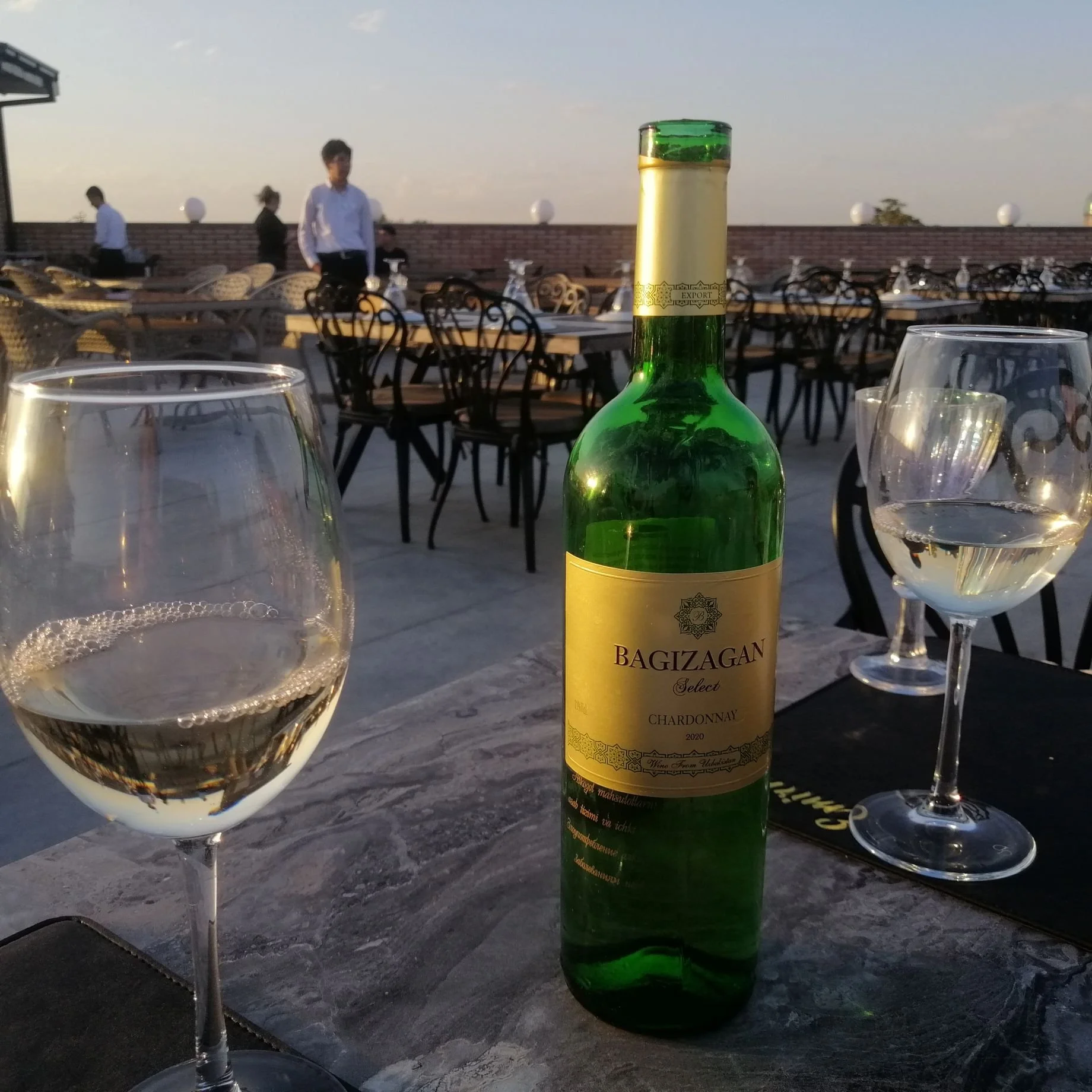 Uzbek white wine at a rooftop restaurant in Samarkand.