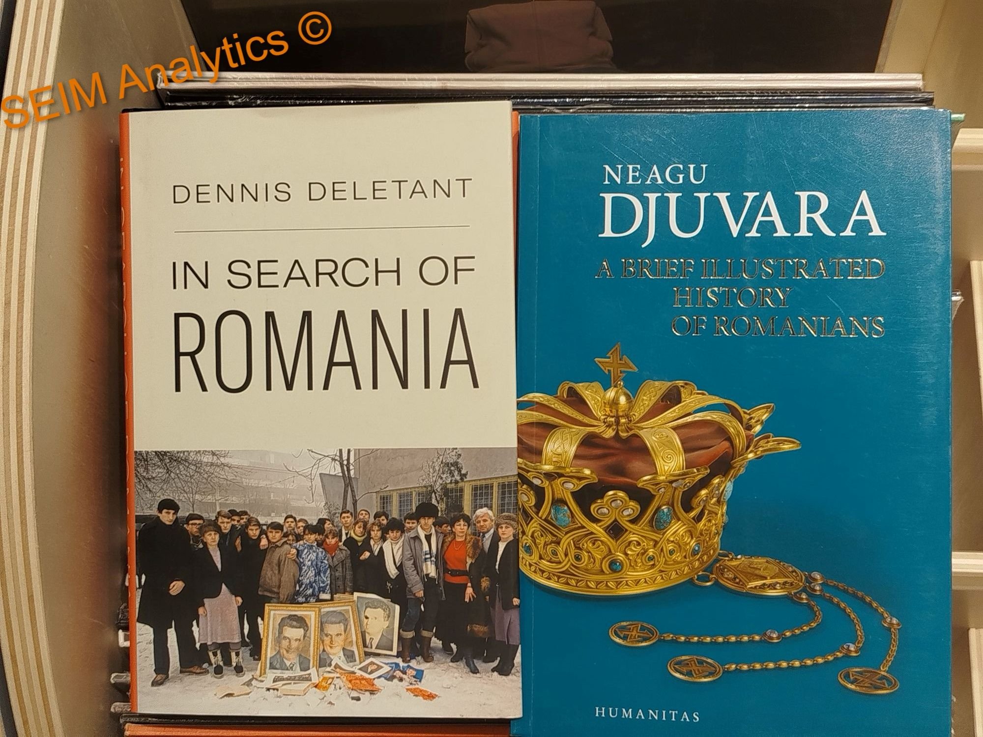 Two key books on Romanian history, one titled 'In Search of Romania' by Dennis Deletant, and the other titled 'A Brief Illustrated History of Romanians' by Neagu Djuvara.