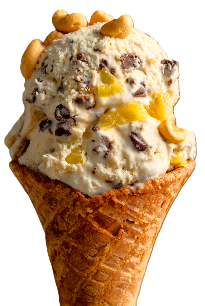 a scoop of rainforest ice cream with cashews, tropical fruits and coconut cream