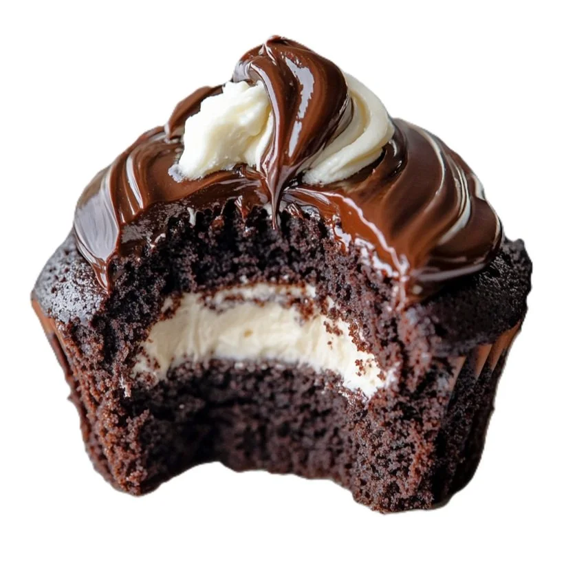 close up of copycat hostess cupcake, chocolate cake with cream filling