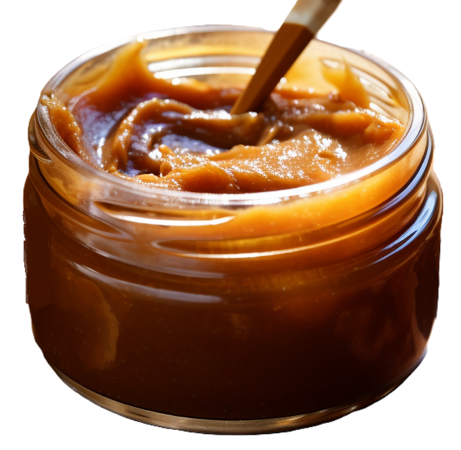 clear jar of pumpkin butter with spices