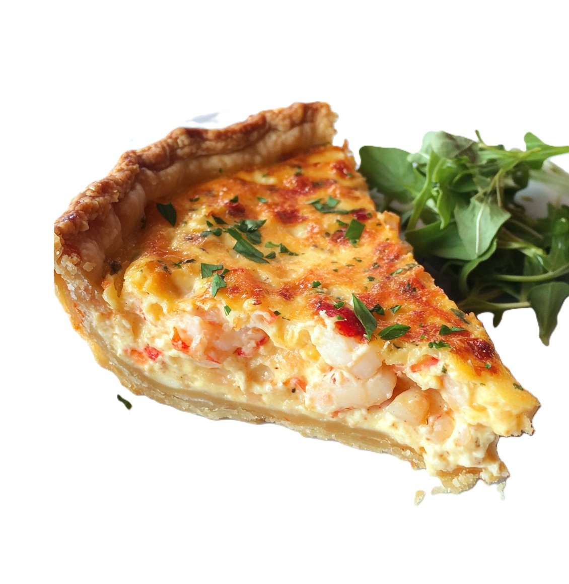a piece of Golden slice of lobster quiche on a white plate with herbs on top.