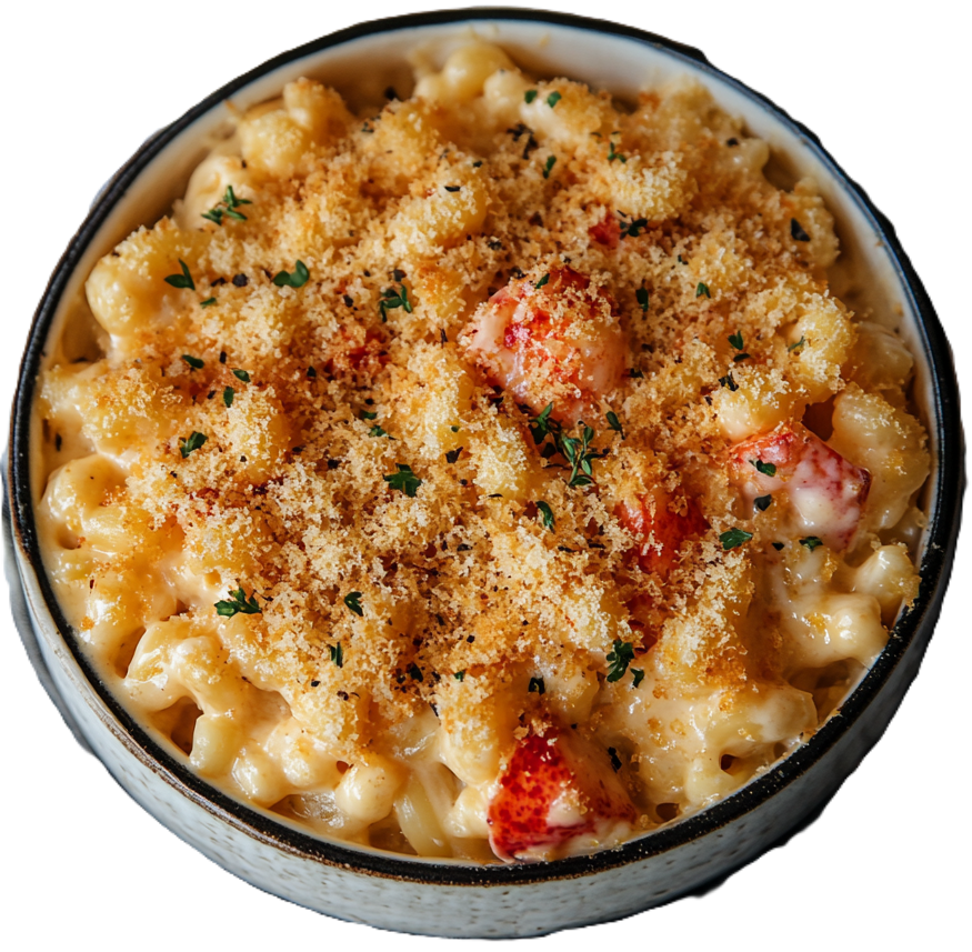Close up of lobster mac and cheese garnished with parsley, ready to serve.