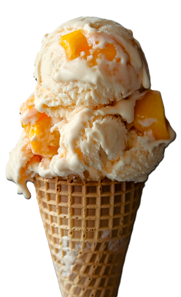 a scoop of homemade peach ice cream in a cone with visible chunks of peaches