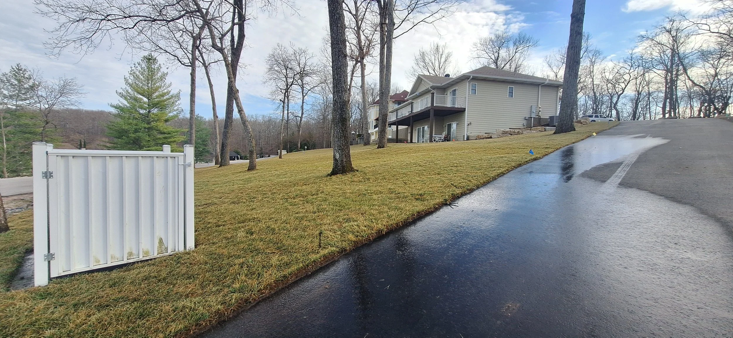 Ledgestone walls, sod, irrigation.