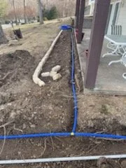 Main irrigation line and gutter drain