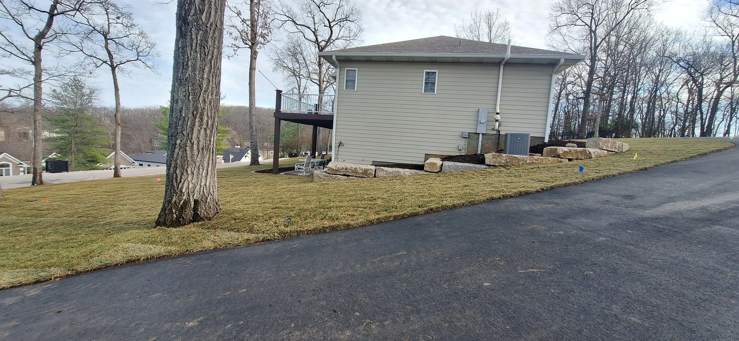 Ledgestone walls, sod, irrigation.