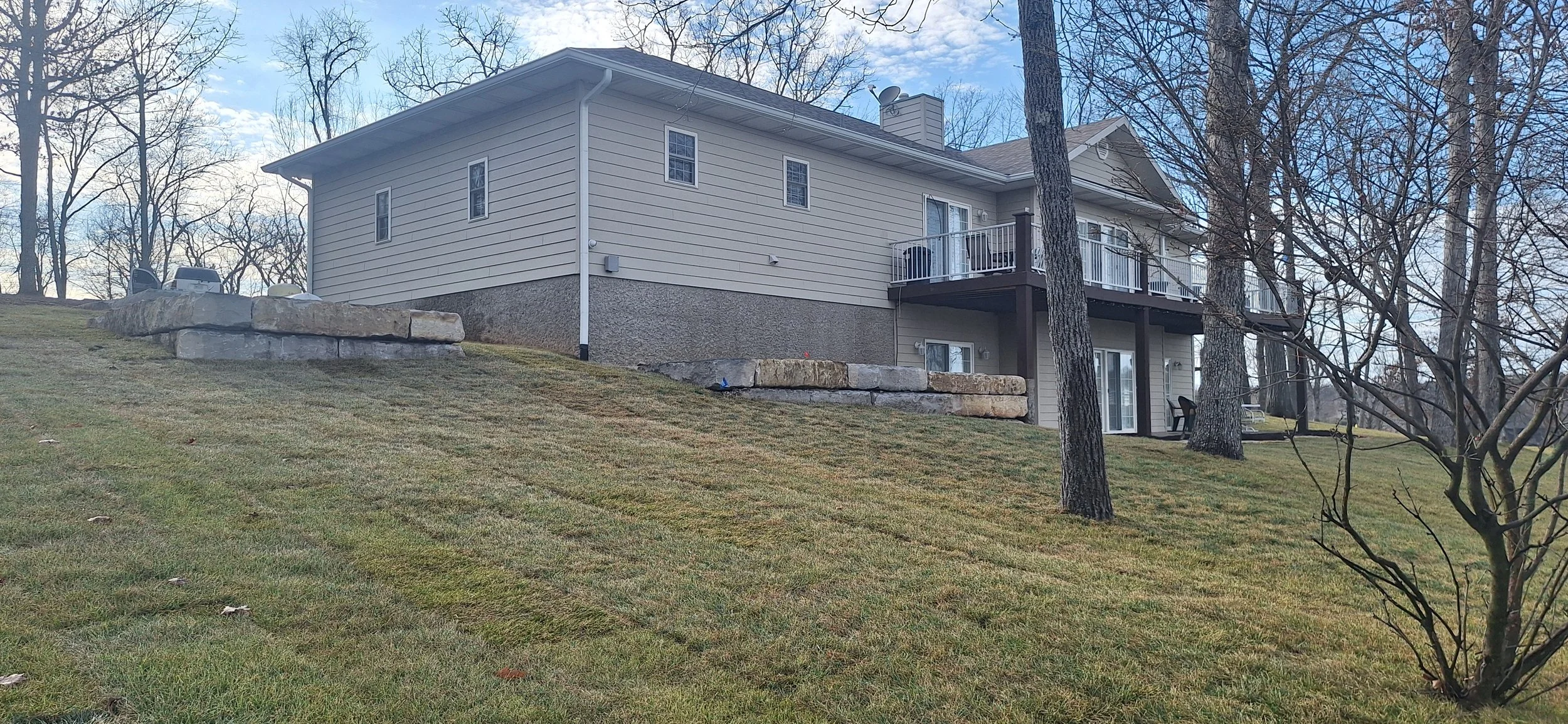 Ledgestone walls, sod, irrigation