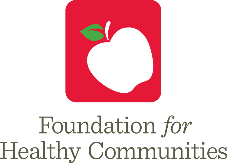 Logo of Foundation for Healthy Communities with a stylized white apple with a green leaf on a red background.