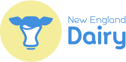 Logo of New England Dairy featuring a blue cow head icon inside a yellow circle with the text 'New England Dairy' to the right.