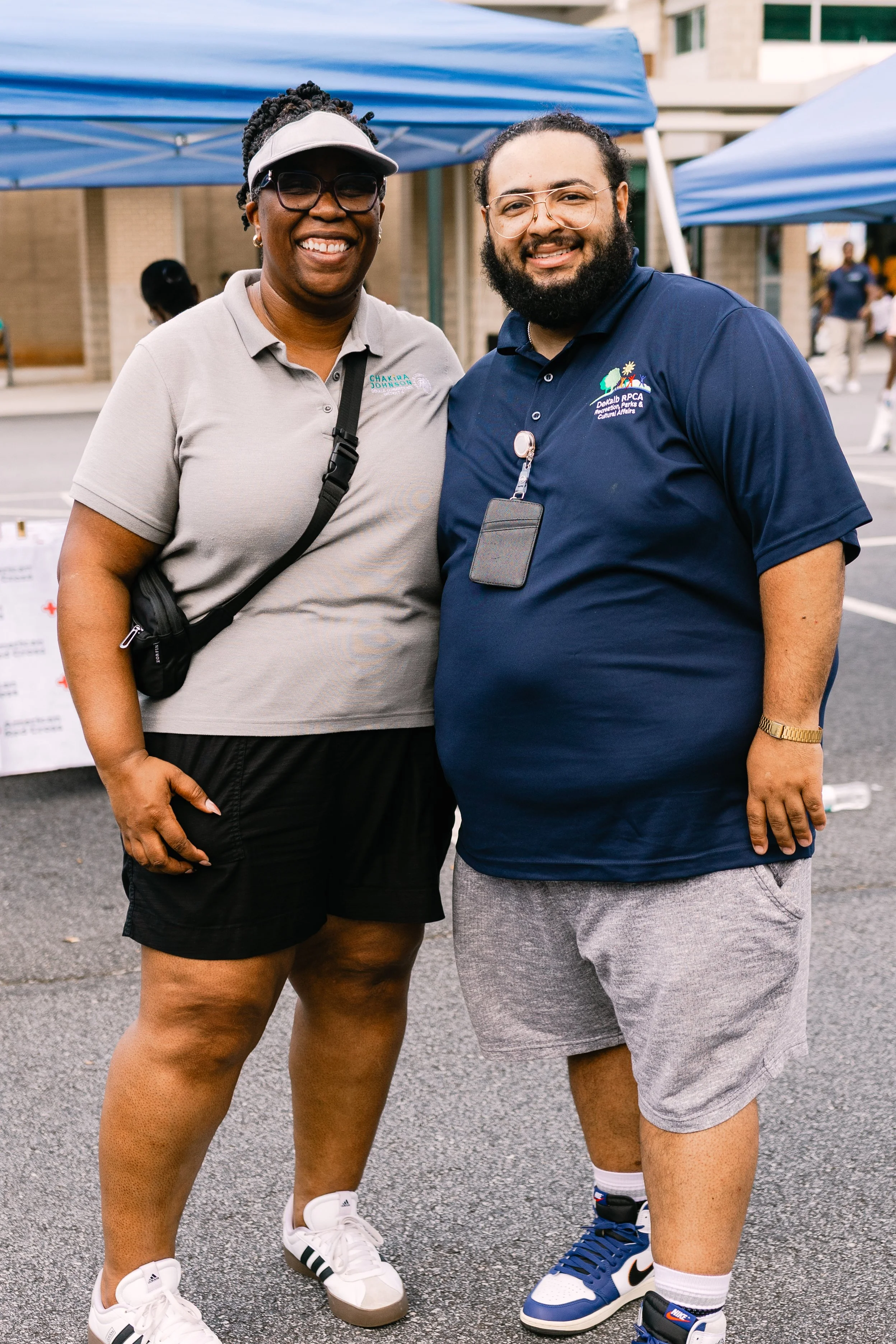 Commissioner Chakira Johnson poses for a photo with a DeKalb County Recreation, Parks & Cultural Affairs staff member at Chakira’s Cookout.