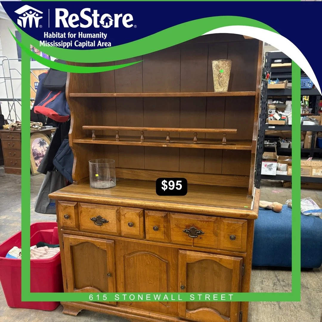 Beautiful furniture, meaningful impact. 🏡 Every purchase at the Habitat Boutique helps families build strength, stability, and self-reliance through affordable housing. Don&rsquo;t miss this gorgeous wooden cabinet with matching hutch!