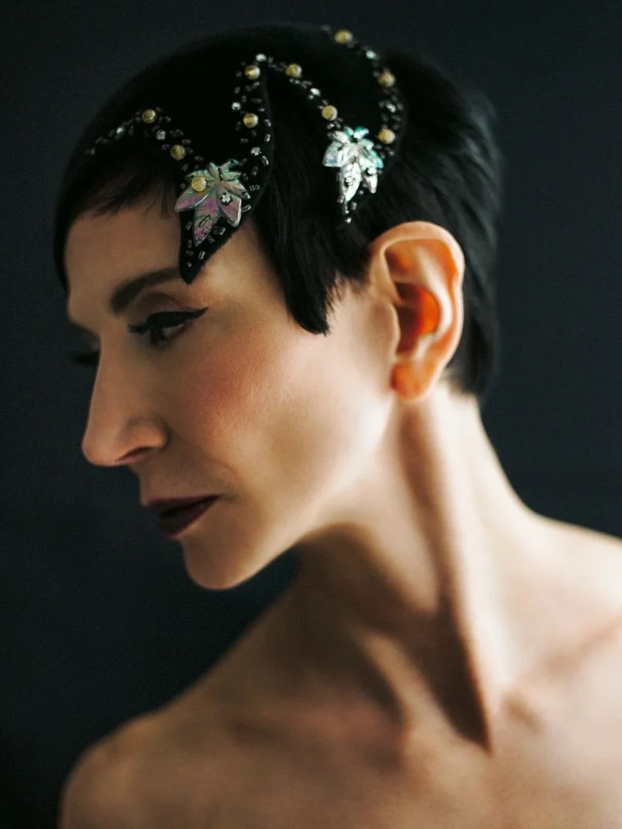Amy Fine Collins portrait with polished hair and bold makeup look, styled by Maysoon Faraj