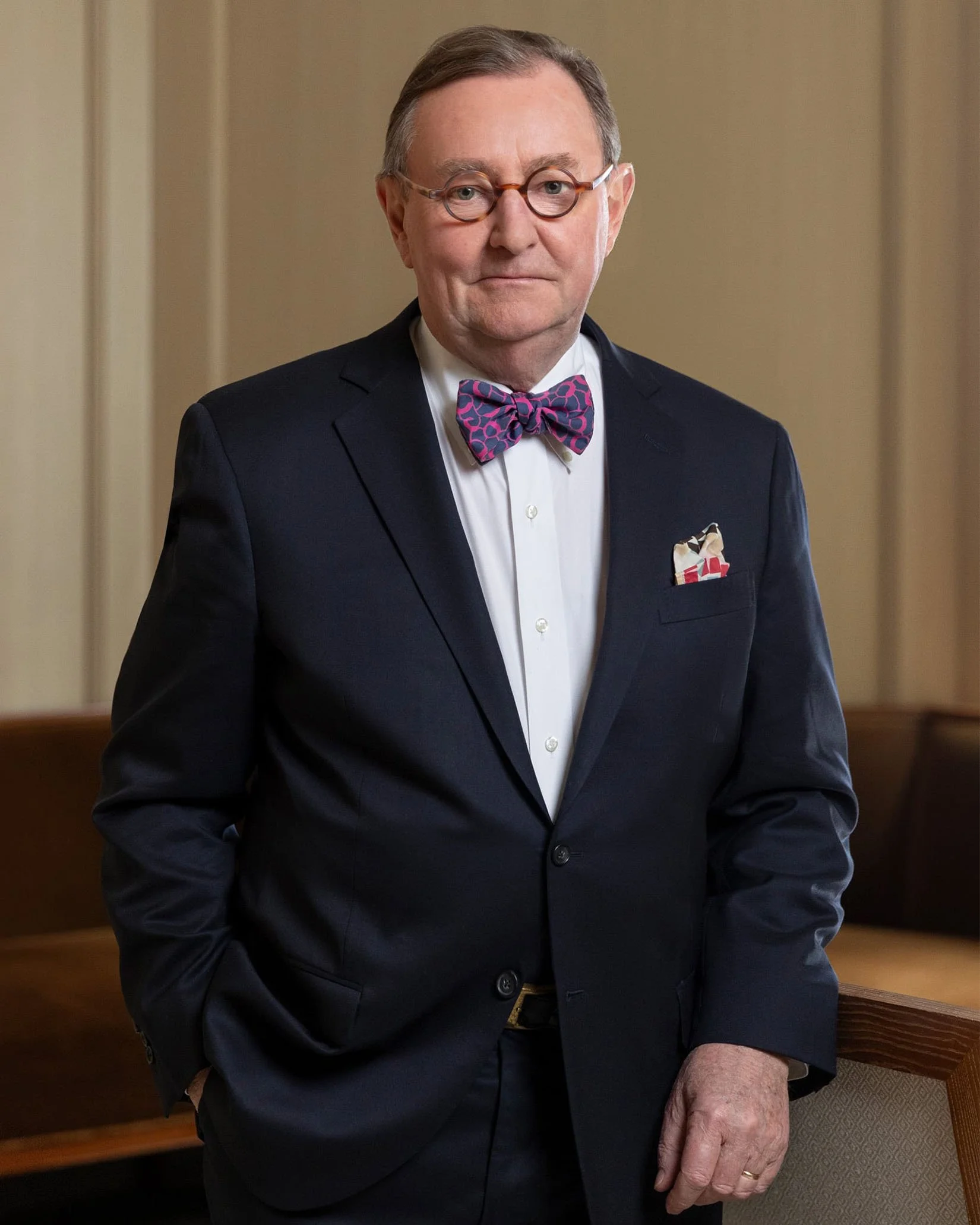 Corporate portrait of a man with polished grooming and natural skin finish by NYC makeup artist