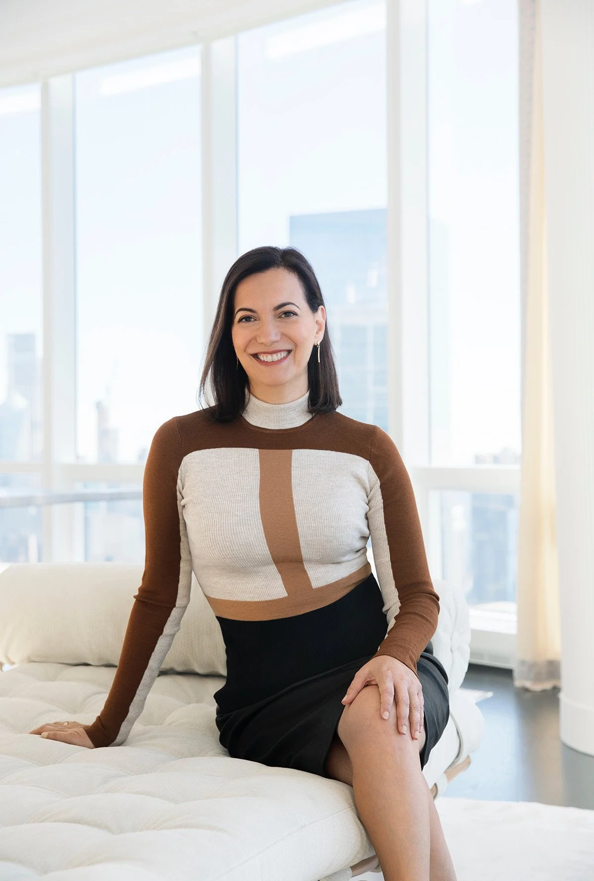 Branding portrait Mara Miller with polished looks by NYC hair and makeup artist