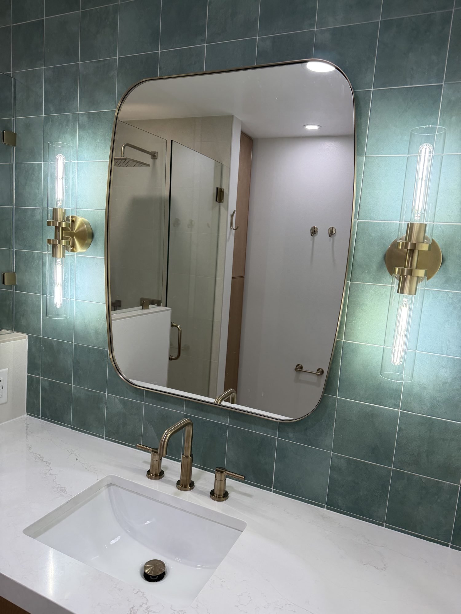 collins-bathroom-remodel-belle-isle-3-brass-sconces-mirror.jpg