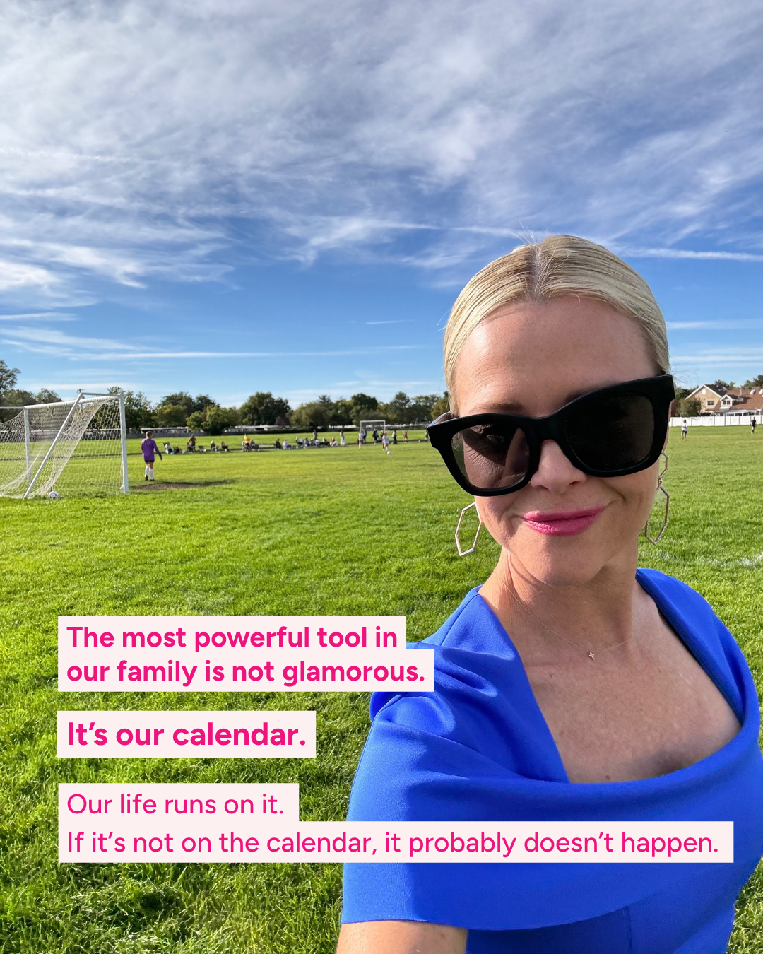 Kristin in a blue top takes a selfie in front of a soccer field. The text on the image is the same as the text in the caption.