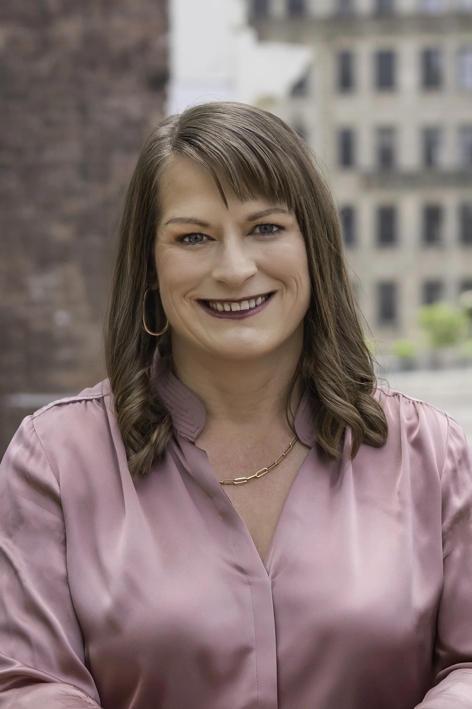 Professional headshot of MerriLyn photographed in New York City