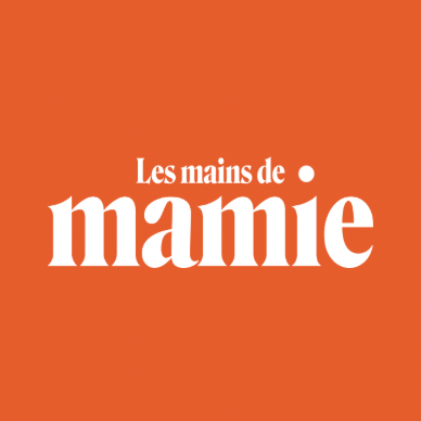 Logo orange avec le texte blanc 'Les mains de mamie'