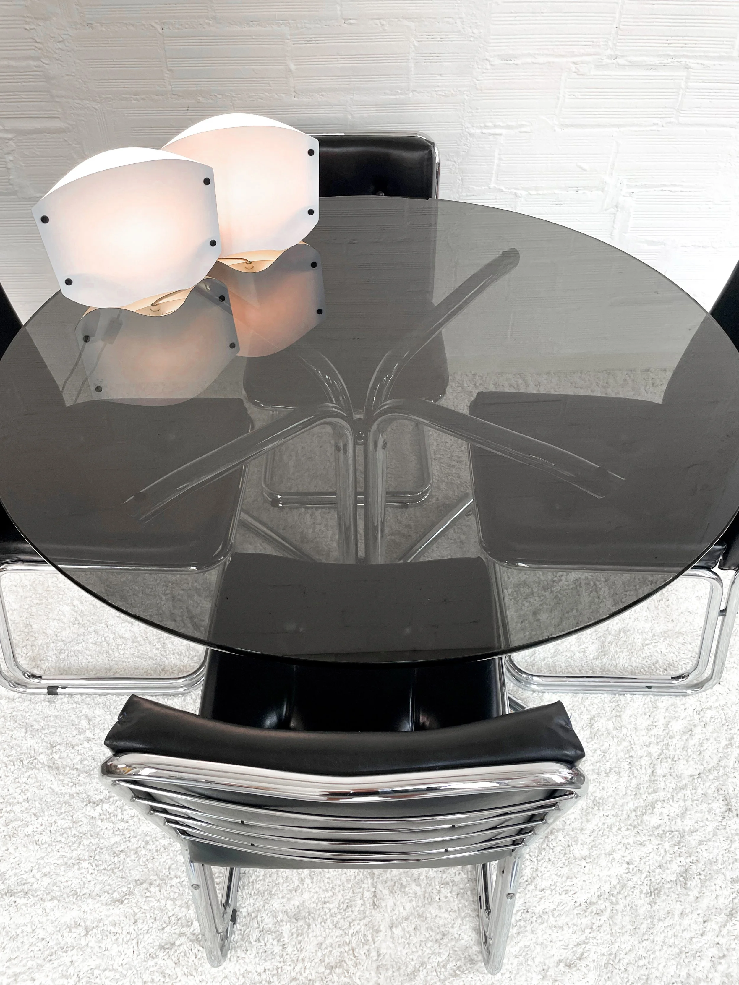 Silla Mid-century con estructura tubular cromada doble. Color negro. Monda Lironda Vintage