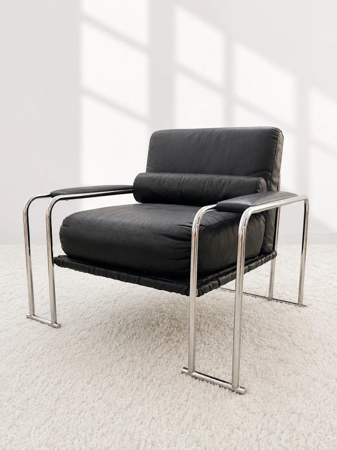 Butaca tubular cromada. Europa, años 70-80