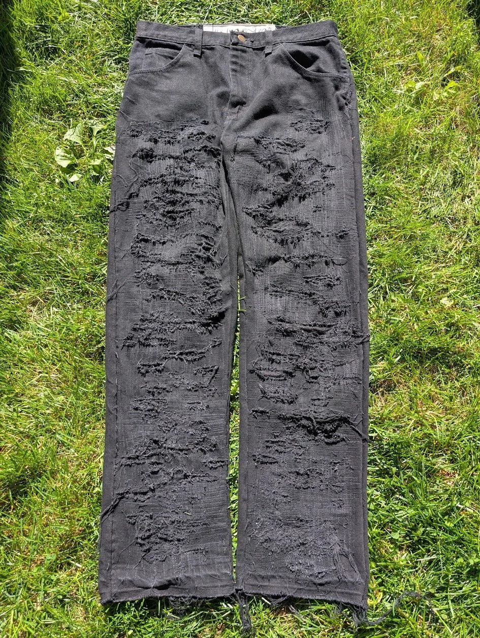 Heavily Distressed & Repaired Black Denim Jeans